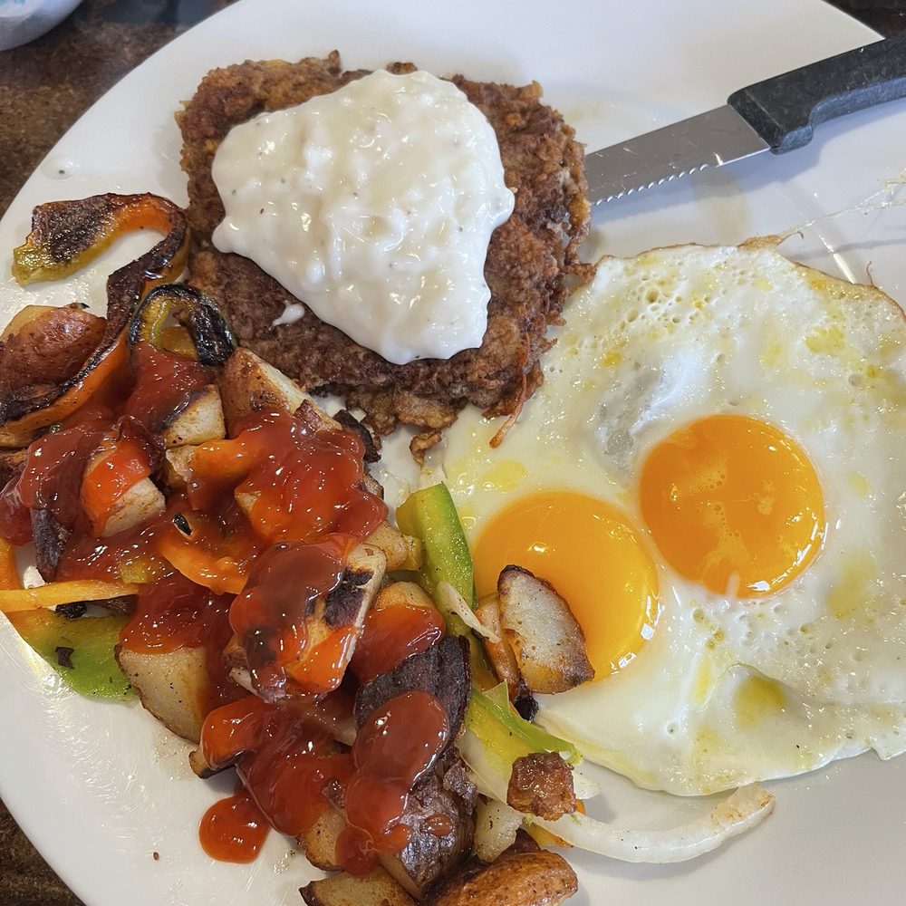 Country fried steak, country potatoes Country fried steak, country potatoes