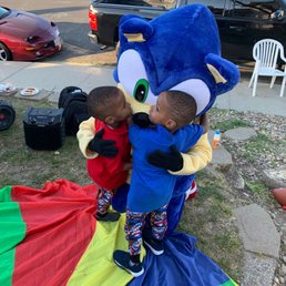 Birthday boys hugging Sonic
