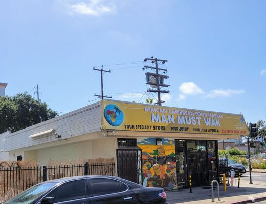 African Caribbean Food Market - Man Must Wak (2) by null