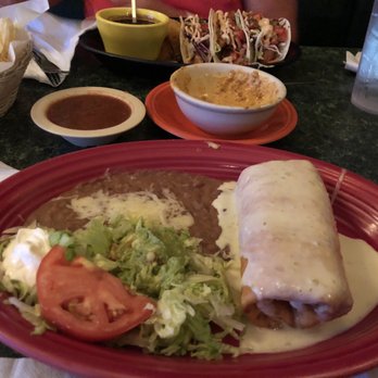 Coyote's Mexican Grill - Chicken chimichanga & fish tacos with chorizo queso in the middle - Mexican Near Me - Decatur, Georgia