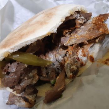 Shawarma Empire - Beef shawarma pocket CUT IN HALF! Huge portions. Quality meat, fresh vegetables and other ingredients The best shawarma in Canada. - Middle Eastern Near Me - Scarborough, Ontario