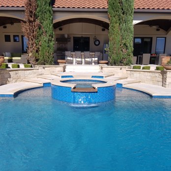 Hines Pool & Spa - Renovation - resurface with Pebble Sheen Blue Surf, new glass tile, new stainless steel wedge scuppers - Pool Cleaners Near Me - Austin, Texas Hines Pool & Spa - Renovation - resurface with Pebble Sheen Blue Surf, new glass tile, new stainless steel wedge scuppers - Pool Cleaners Near Me - Austin, Texas