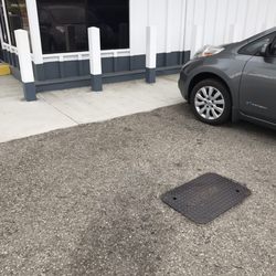 Telephone Shell - Is this a parking spot, unauthorized use of the lot blocking people's way