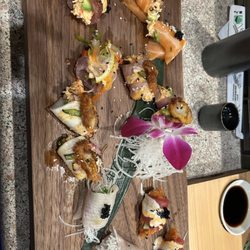 Mikasa Asian Fusion - Sushi chefs being amazing. Tuna lover, tuna wrap, salmon lover. The kids loved the spicy tuna hand rolls and the mamacita was a hit