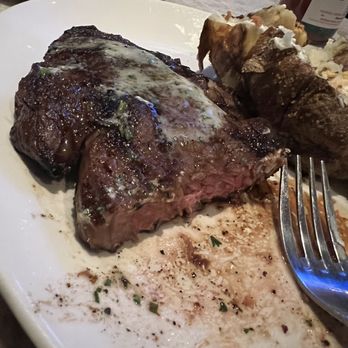 Stoney River - Ribeye and baked potato (medium) - Steakhouses Near Me - Troy, Michigan Stoney River - Ribeye and baked potato (medium) - Steakhouses Near Me - Troy, Michigan