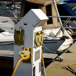 Anchorage Yacht Club Condo Assn - Each slip has an electric post with two 30amp outlets and dockside water hook-up.