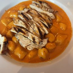 Gnocchi is creamy tomatoes sauce topped with grilled chicken breast. My granddaughter enjoyed her spaghetti bolognese.