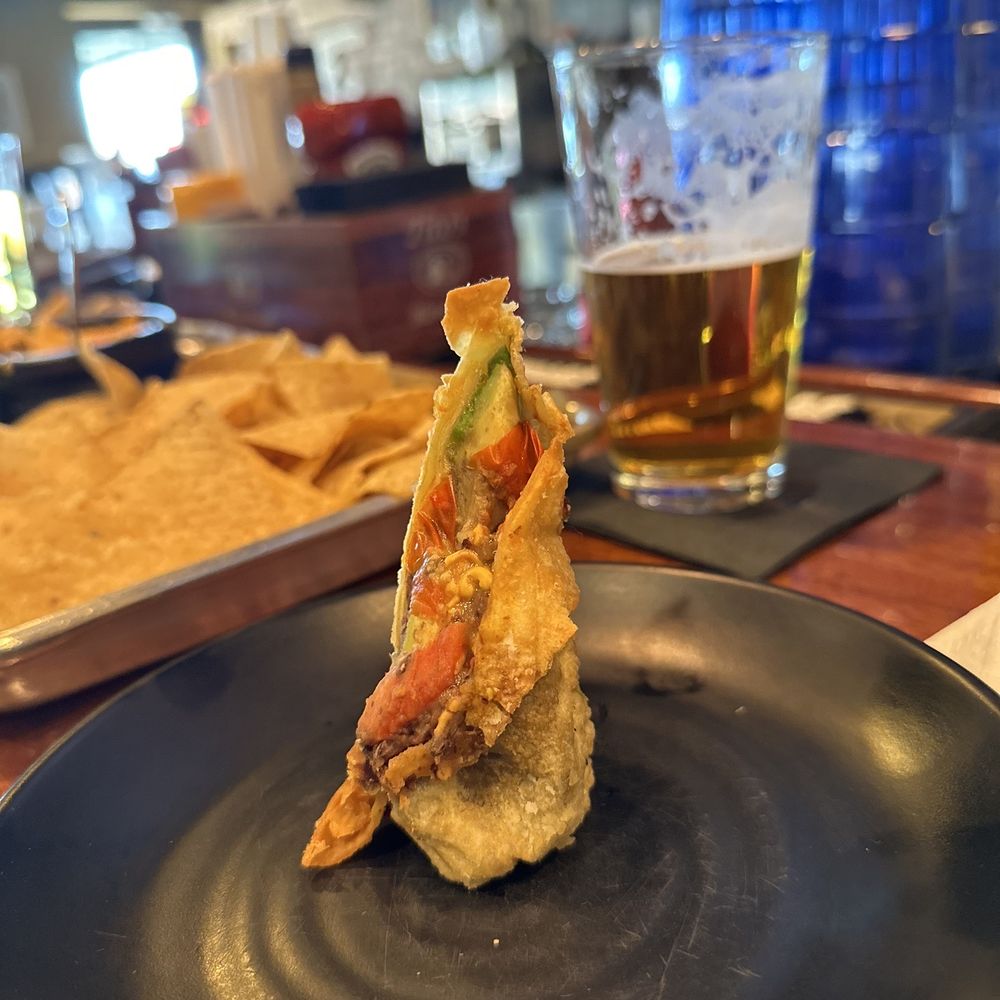The Famous Restaurant - Guacamole egg roll. - Sports Bars Near Me - Centerville, Ohio The Famous Restaurant - Guacamole egg roll. - Sports Bars Near Me - Centerville, Ohio