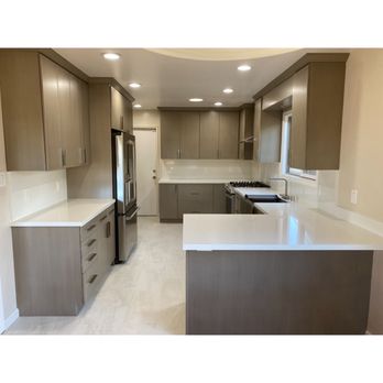 The Floor Store - a kitchen with a center island - Carpeting Near Me - Richmond, California