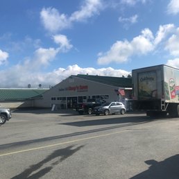 a truck parked in front of a building