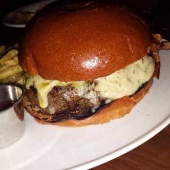 The Merchant - Over sauced cardboard burger - New American Near Me - Boston, Massachusetts The Merchant - Over sauced cardboard burger - New American Near Me - Boston, Massachusetts