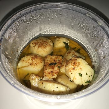 Off the Hook Seafood & Grill - Sautéed Scallops ($11.99) 1/2 pound in butter garlic sauce. - Seafood Near Me - Lansdowne, Pennsylvania