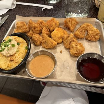 Lucille's Smokehouse Bar-B-Que - Hot Honey Cauliflower Bites and Country Fair Corn Pudding - Barbeque Near Me - Valencia, California Lucille's Smokehouse Bar-B-Que - Hot Honey Cauliflower Bites and Country Fair Corn Pudding - Barbeque Near Me - Valencia, California