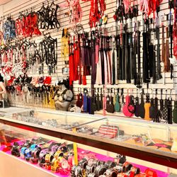 Flirty Rabbit - Large Bondage Section
Floggers, ankle cuffs, wrist cuffs, harnesses, crops, hog ties, bed restraints, breast forms, paddles, impact paddles