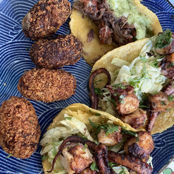 Ibéxico - a plate of tacos and other food items - Desserts Near Me - Berkeley, California