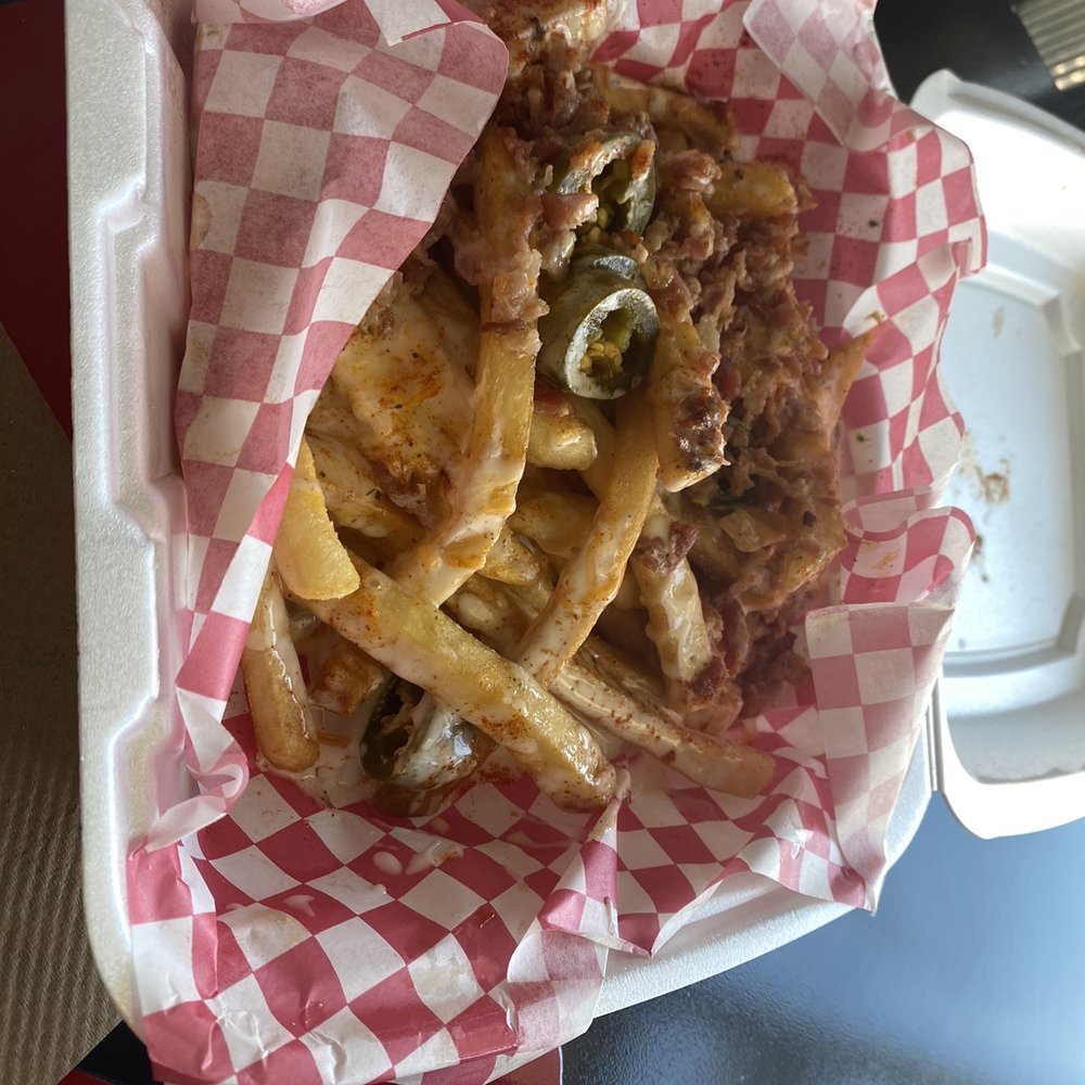 Riko's Kickin' Chicken - Loaded Kickin Fries - Chicken Wings Near Me - Memphis, Tennessee Riko's Kickin' Chicken - Loaded Kickin Fries - Chicken Wings Near Me - Memphis, Tennessee