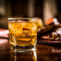 Steps Lounge - Classic Cocktails served up, neat & with a twist! Like Negroni, Dark & Stormy, Bourbon Sour, Old Fashioned, and Mint Julep to name a few