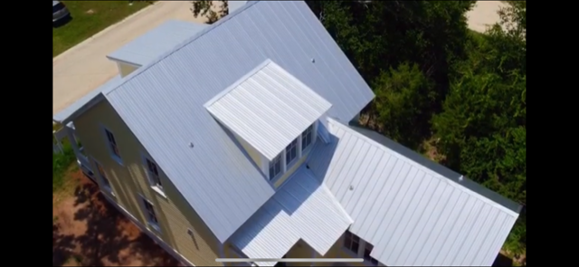 Slide of Taylor Made Roofing