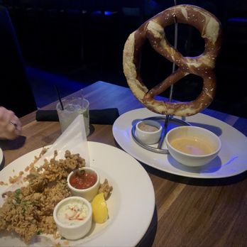 Yard House - Jumbo Bavarian Pretzel and Fried Calamari - Bars Near Me - Sunrise, Florida Yard House - Jumbo Bavarian Pretzel and Fried Calamari - Bars Near Me - Sunrise, Florida