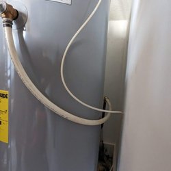 The Duke Of Plumbing - Water heater getting up to code.