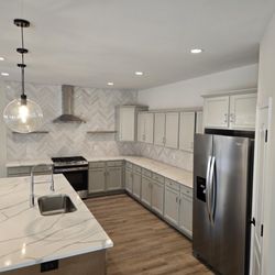 First Class Electric - Added pendant lighting  6 recessed to this kitchen #2024