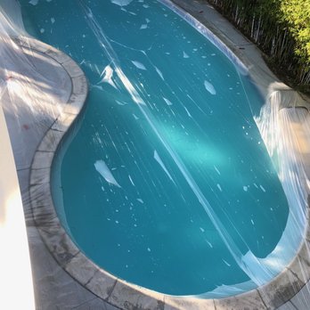 Reliable Roofing - Protecting our property while applying the foam roof. - Roofing Near Me - Palm Desert, California