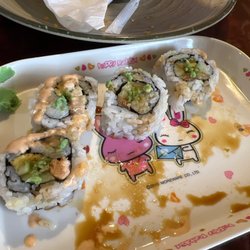 Fuji Express - Spicy salmon roll. Comes warm with half cooked salmon. Had to add wasabi and soy sauce as no dipping bowl was provided for sushi.