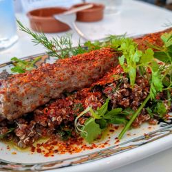 Moriarty Meats Café Bar - Shashlik with tabbouleh, yogurt sauce, and fresh herbs.