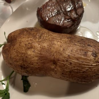 Lewnes' Steakhouse - Petite fillet with baked potato - Steakhouses Near Me - Annapolis, Maryland Lewnes' Steakhouse - Petite fillet with baked potato - Steakhouses Near Me - Annapolis, Maryland