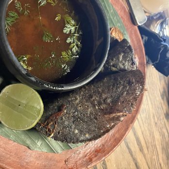 Amano - Tacos de Birria and Caldo de res with cilantro - Cocktail Bars Near Me - Caldwell, Idaho
