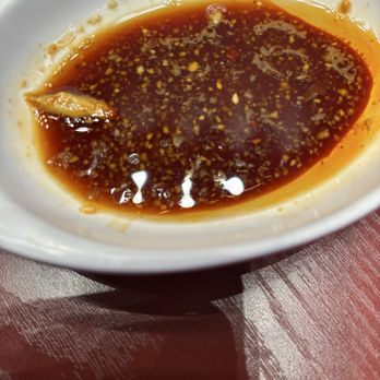 Dumpling Xi - Soy sauce, hot sauce, sesame oil, garlic - Chinese Near Me - Flushing, New York Dumpling Xi - Soy sauce, hot sauce, sesame oil, garlic - Chinese Near Me - Flushing, New York