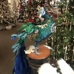 Stunning peacock greets you at the main entrance Stunning peacock greets you at the main entrance