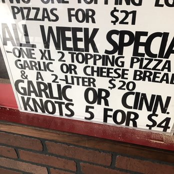 Fatty'z Pizza - a sign in a window - Pizza Near Me - Mountain Home, Idaho Fatty'z Pizza - a sign in a window - Pizza Near Me - Mountain Home, Idaho