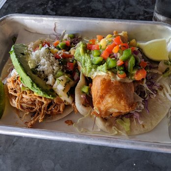 Social Cantina - Left : chicken tinka Right : Baja fish - Tacos Near Me - Bloomington, Indiana