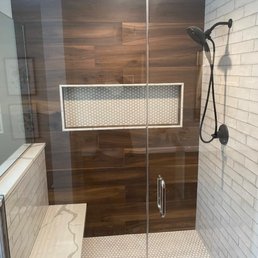 Beautiful tile work!  Love the bench!