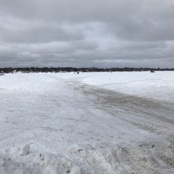Ice fishing and walking trail plowed into the ice.