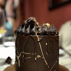 Casita Miramar - Amazing chocolate Fudge Cake delivered to restaurant (Cakes by Glorimar in PR). Staff sang and added candle