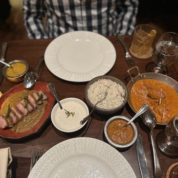 Junoon - Daal Makhani, Yellow Daal Tadka, Basmati Rice, Garlic Naan, Goat Pulled Lamb Curry, & Tellicherry Chicken - Indian Near Me - New York, New York