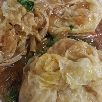 Dew Drop Inn - Vegetable Bean Curd, stuffed with long rice noodles, mushrooms, and carrots, on a bed of choice sum - Chinese Near Me - Honolulu, Hawaii Dew Drop Inn - Vegetable Bean Curd, stuffed with long rice noodles, mushrooms, and carrots, on a bed of choice sum - Chinese Near Me - Honolulu, Hawaii