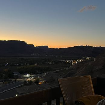 Sunset Grill - a view of a town and mountains - Steakhouses Near Me - Moab, Utah Sunset Grill - a view of a town and mountains - Steakhouses Near Me - Moab, Utah