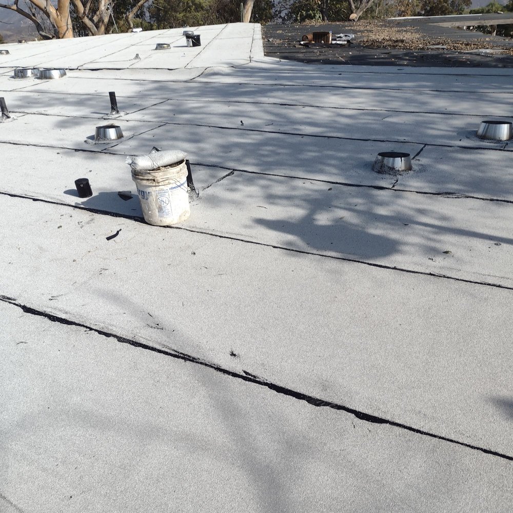 Slide of Mendez roofing