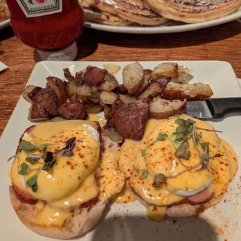 Spoons Cafe - Egg Benedict (ham) and breakfast potatoes, $15.50. - New American Near Me - Baltimore, Maryland
