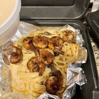 Ovation Bistro & Bar - a pan of pasta and shrimp - Bars Near Me - Winter Haven, Florida Ovation Bistro & Bar - a pan of pasta and shrimp - Bars Near Me - Winter Haven, Florida