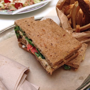 Amblè - Hot toast of the day with hummus, spinach, tomato and almond in a 5 cereals bread! - Sandwiches Near Me - Florence, FI