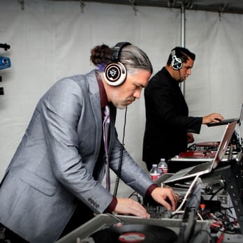 Loud DJs - DJs Elixir and Cali tag-teaming on four turntables for the ultimate DJ experience! Not your typical wedding DJs! Photo: Aleasha Aguilar - DJs Near Me - Thousand Oaks, California Loud DJs - DJs Elixir and Cali tag-teaming on four turntables for the ultimate DJ experience! Not your typical wedding DJs! Photo: Aleasha Aguilar - DJs Near Me - Thousand Oaks, California