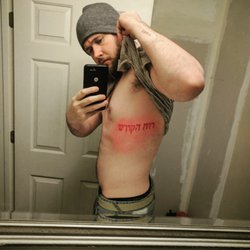 East Coast Dragon Tattoo - This is a very sensitive areas with smaller detailed letters. I won't lie this hurt the first half.