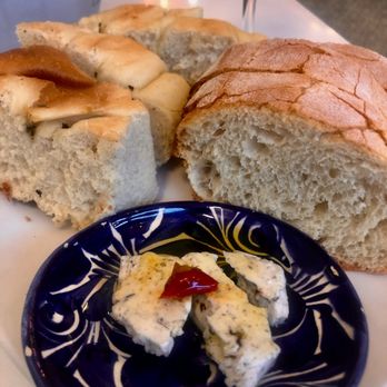 Limoncello - Warm breads, served with Truffled Porcini Butter with Extra Virgin Olive Oil and Calabrese Pepper. - Italian Near Me - La Mesa, California Limoncello - Warm breads, served with Truffled Porcini Butter with Extra Virgin Olive Oil and Calabrese Pepper. - Italian Near Me - La Mesa, California