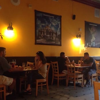Texas Mexican - Inside. Fun yellow painted walls and interesting wall art. - Mexican Near Me - Freehold, New Jersey Texas Mexican - Inside. Fun yellow painted walls and interesting wall art. - Mexican Near Me - Freehold, New Jersey