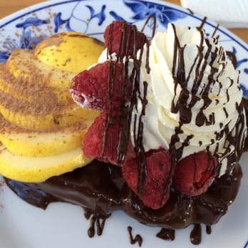 The Waffle Window - The "falling leaves" so so so good... Chocolate covered waffle w/ pear, raspberries. And whipped cream & choc drizzle - Breakfast & Brunch Near Me - Portland, Oregon