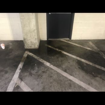 Domain West Apartments - Stained floors all over the parking garage "luxury living" my ass - Apartments Near Me - Houston, Texas